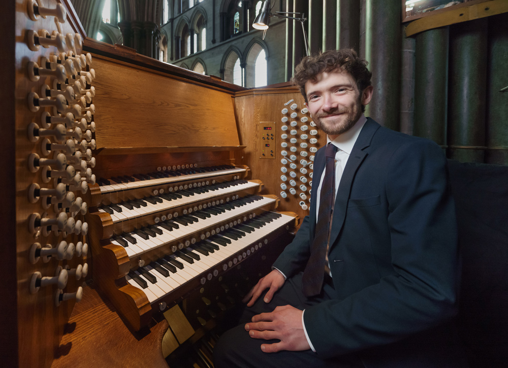 Festival organiser and assistant director of music John Challenger pictured in the organ loft, photo by Ash Mills