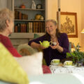 Lizzie sharing tea magic with Jill, photo by Sarah Dollar