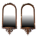 A pair of early Victorian giltwood and gesso Pier mirrors with ribbon decoration are estimated at £200-£400