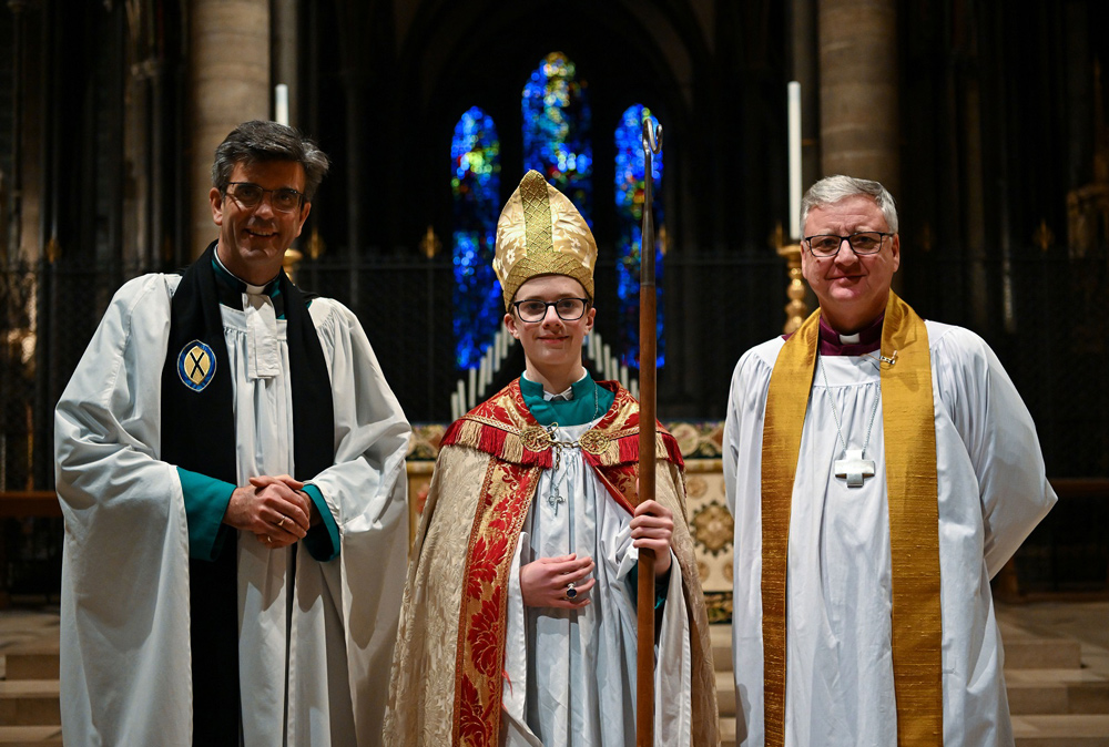 Chorister Bishop Rory Law with the Dean of Salisbury (L) and the Bishop of Salisbury