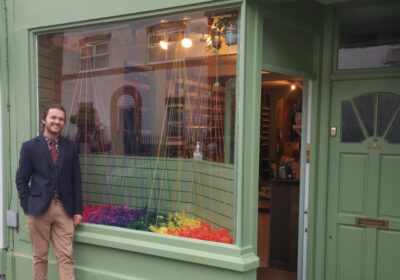 Pierre stands outside the shop he opened in March