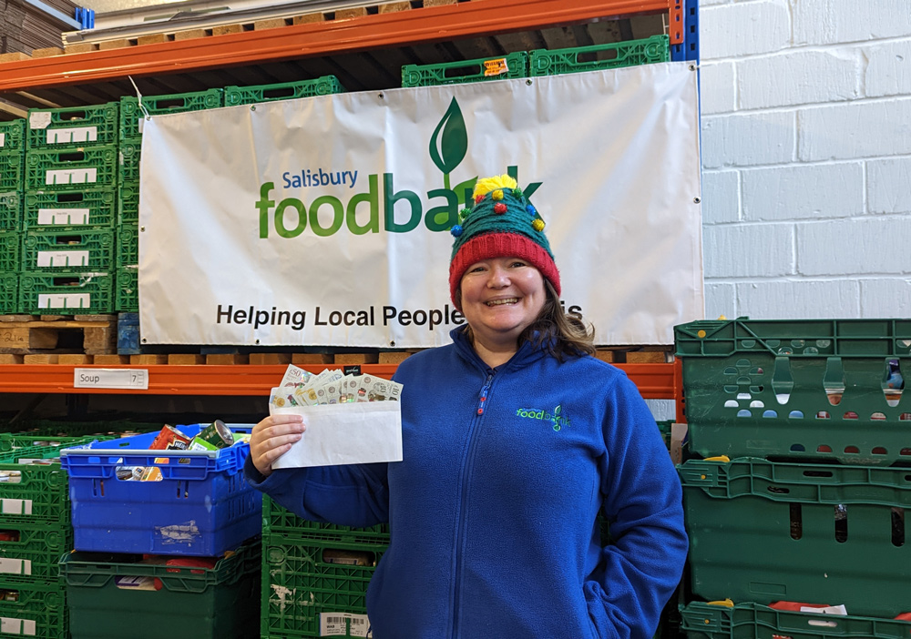 Salisbury Food Bank manager Maria Stevenson with the donation. Picture: Salisbury & Avon Gazette