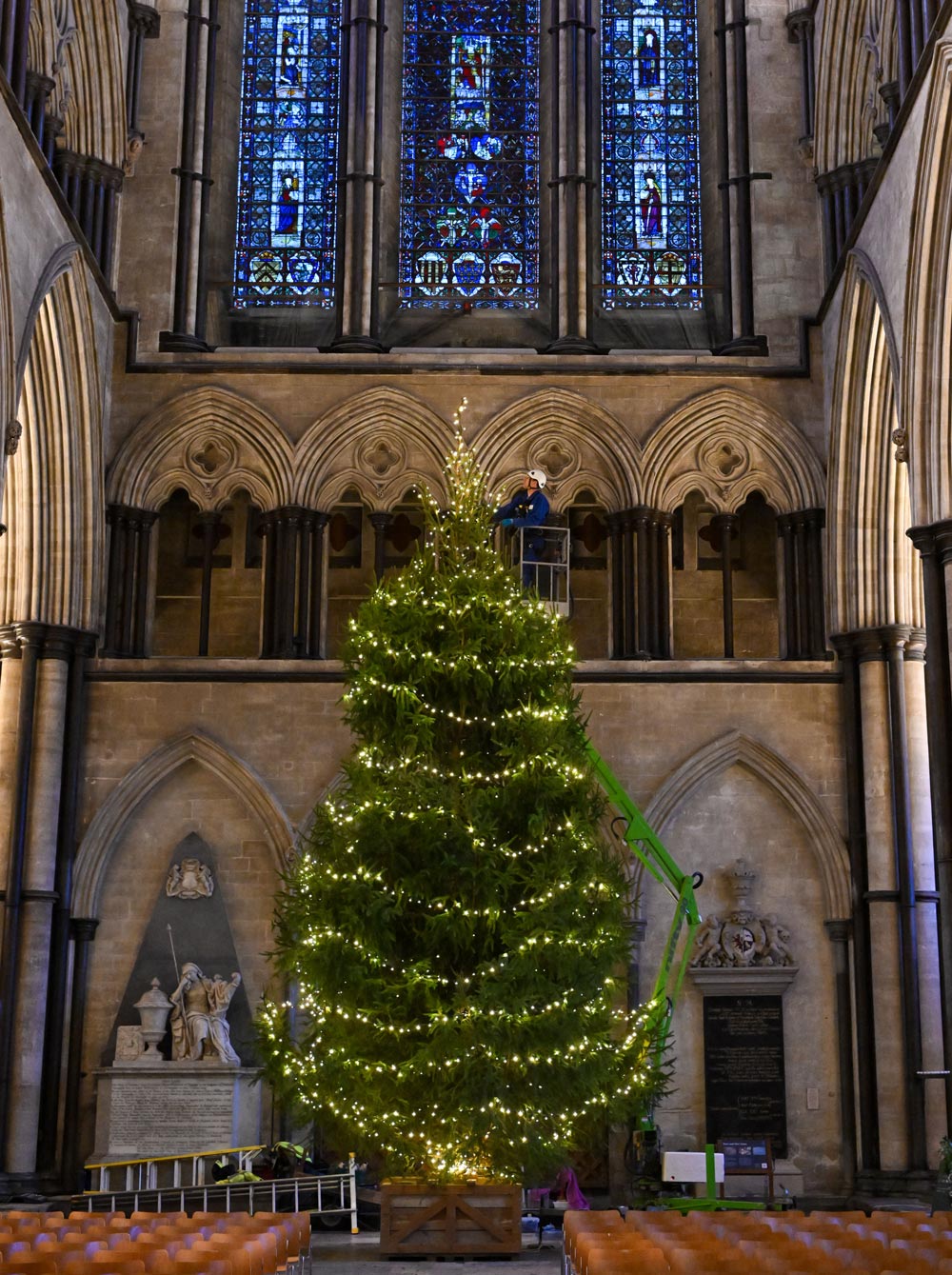The 32ft tree was delivered in the morning and by the afternoon was aglow with 1,000 LED lights thanks to the expertise of cathedral staff Pictures: Finnbarr Webster