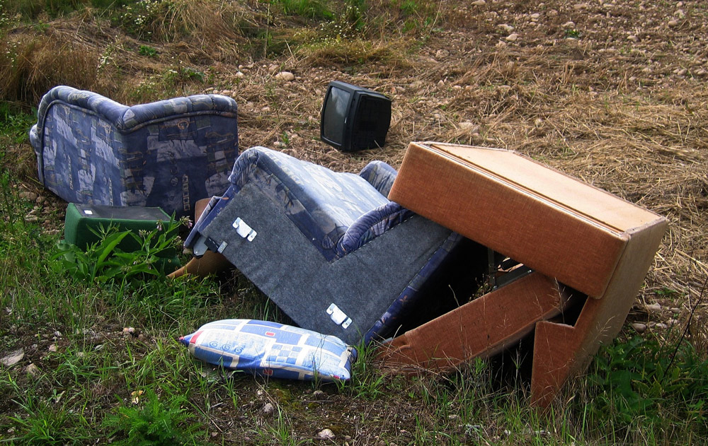 Fly-tipping, like the example above, is a blight on rural communities Credit: Pixabay