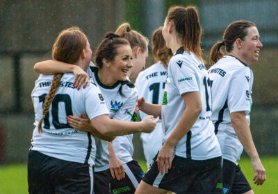 Players congratulate Evie Cummings after the defender scored in the recent 4-1 win against Trowbridge