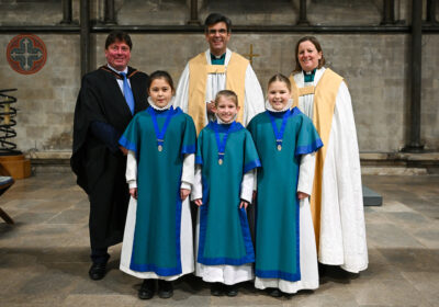 The new girl choristers with L-R Clive Marriott, Salisbury Cathedral School Headmaster, The Dean of Salisbury and Canon Anna Macham, Canon Precentor. Credit: Finnbarr Webster