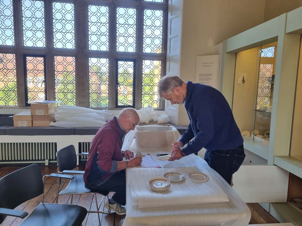 Volunteers carefully packing items in the museum’s galleries ahead of the building restoration work