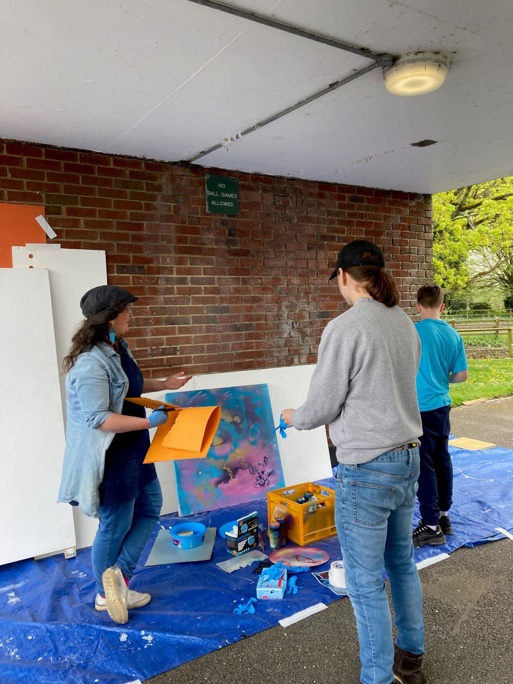 Kezia Hoffman has been teaching locals the skills needed to create street art that will form part of The Tempest production, including the large skate ramp,