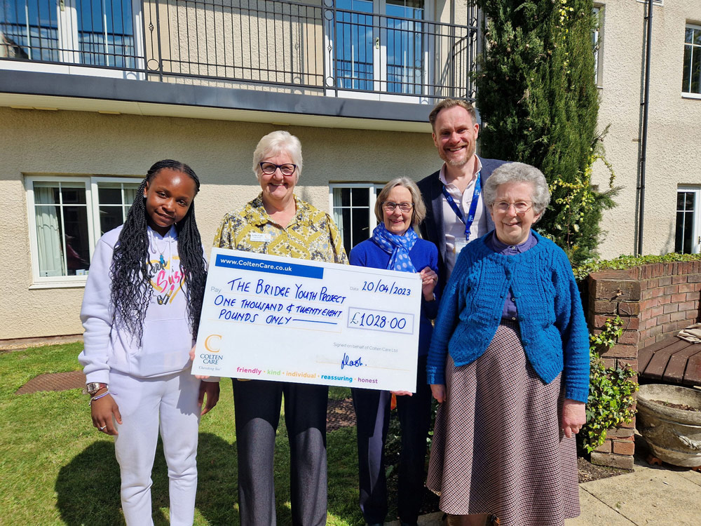 From left: Gladys Nyirongo, a student from Sarum Academy School; home manager Jackie Cash; Daphne Jennings, whose late husband Neville was a co-founder of The Bridge and a resident at Braemar Lodge; Bridge director Alex Ewing and co-founder, Gaye Ridout