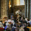 Poet Martin Figura reading at the We Reflect service, held at Salisbury Cathedral in March 2022