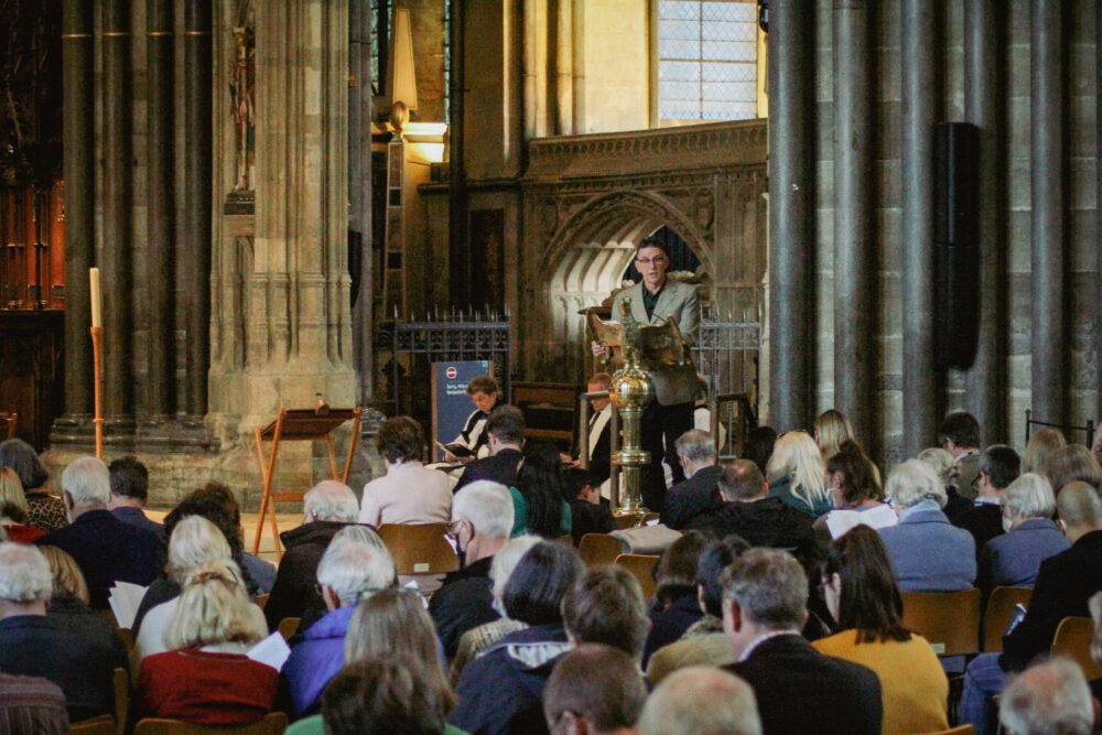 Poet Martin Figura reading poem during the We Reflect service at Salisbury Cathedral in March 2022