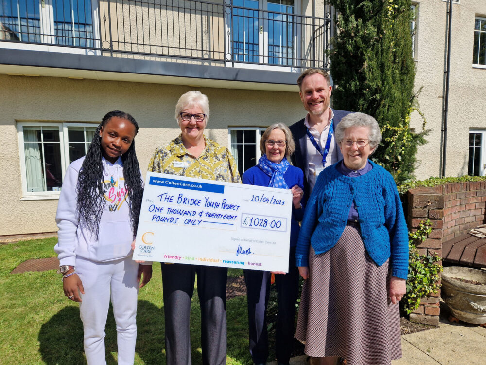 From left: Gladys Nyirongo, a Year 10 student from Sarum Academy School; home manager Jackie Cash; Daphne Jennings, whose late husband Neville was both a co-founder of The Bridge and a resident at Braemar Lodge; Bridge director Alex Ewing and Bridge co-founder, Gaye Ridout