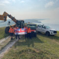 The Landmarc team raising the flag at different locations at Lulworth Ranges