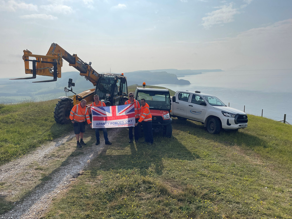 The Landmarc team raising the flag at different locations at Lulworth Ranges