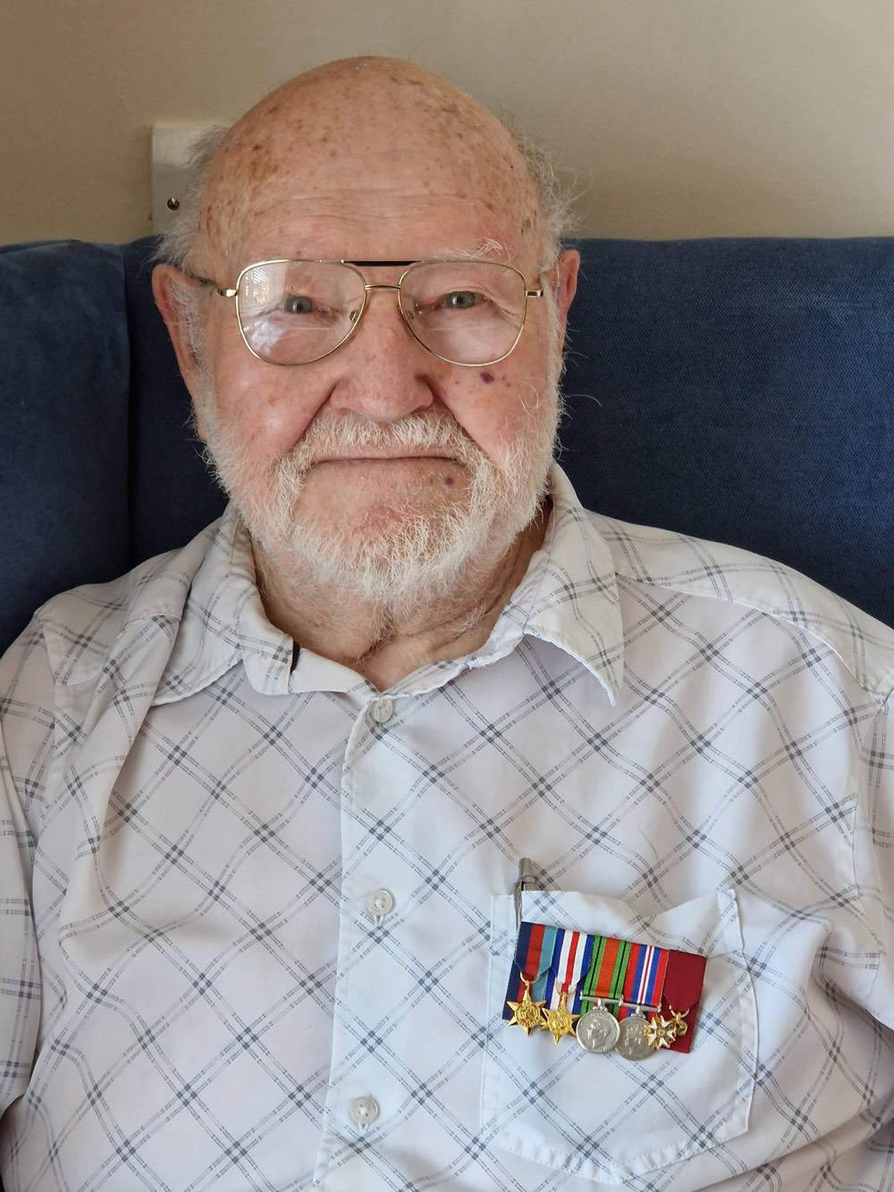 Commander Douglas Parish in his room at Colten Care’s Braemar Lodge in Salisbury where he has been sharing his memories of D-Day with fellow residents.