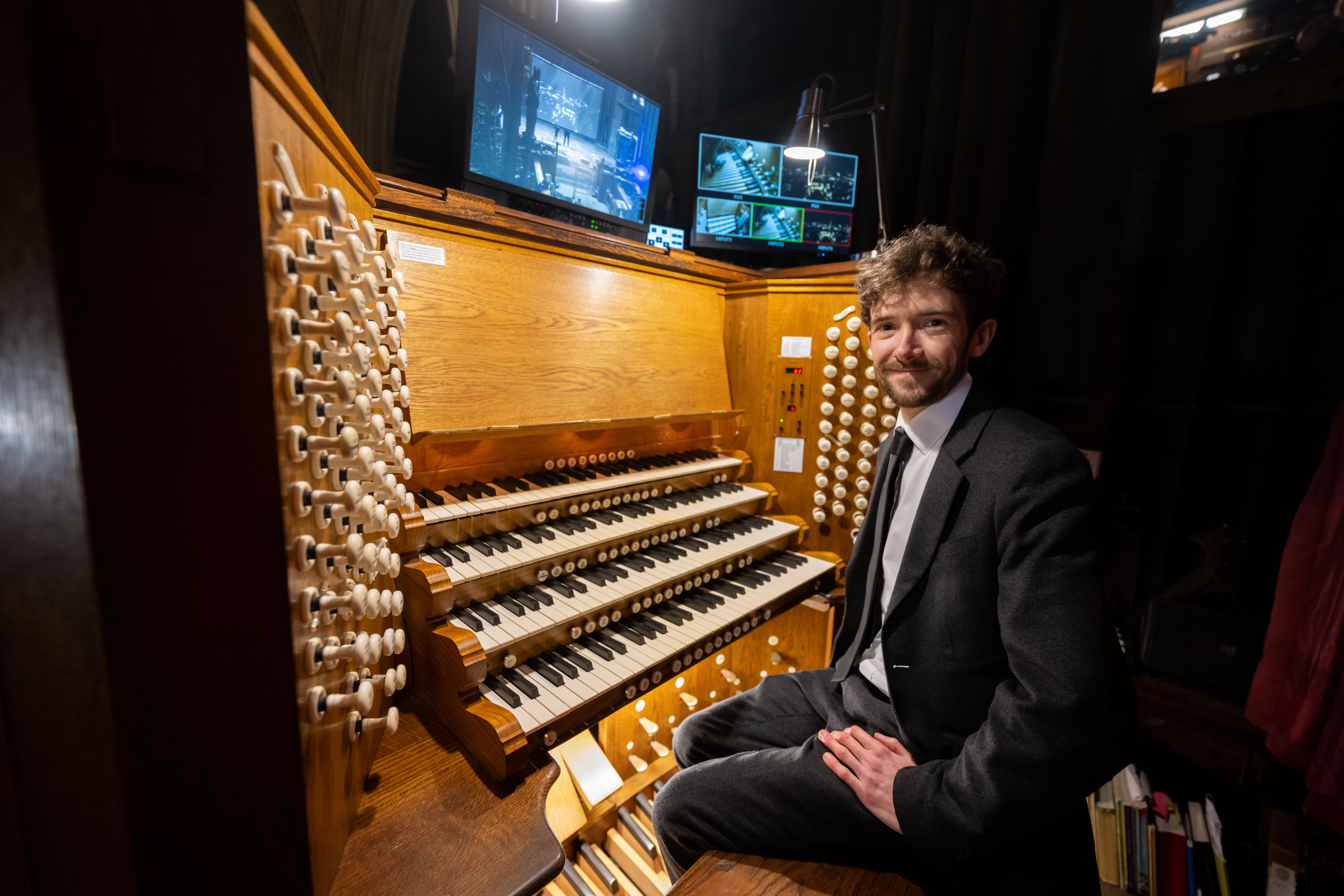 John Challenger, assistant director of music, at the Salisbury Cathedral organ. Picture: Finnbarr Webster