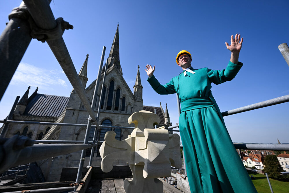 Canon Kenneth Padley carried out the Topping Out blessing at Salisbury Cathedral. Picture: Finnbarr Webster