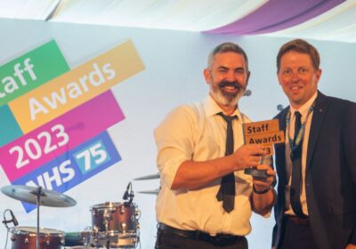 Dr Anderson, left, receiving his award