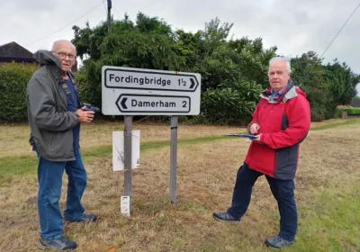 STA team members Nigel Kendall and Simon Freeman record village signage