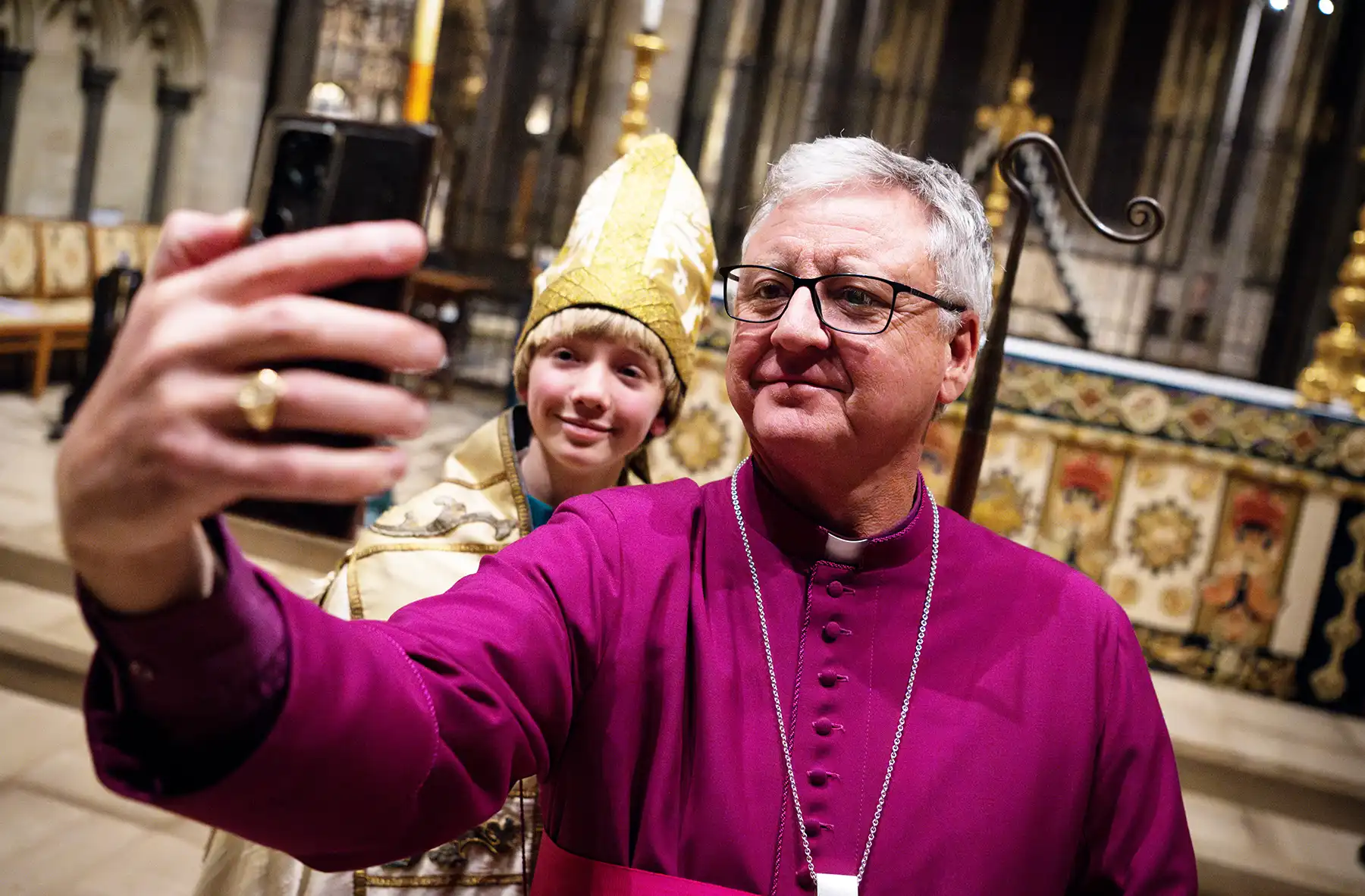 Chorister Bishop Harry Mills poses for a selfie with the then-former Bishop of Salisbury. Picture: Finnbarr Webster