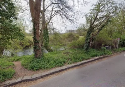 The person was reported to be hanging on to a tree over the river in Lower Road, Salisbury. Picture: Google