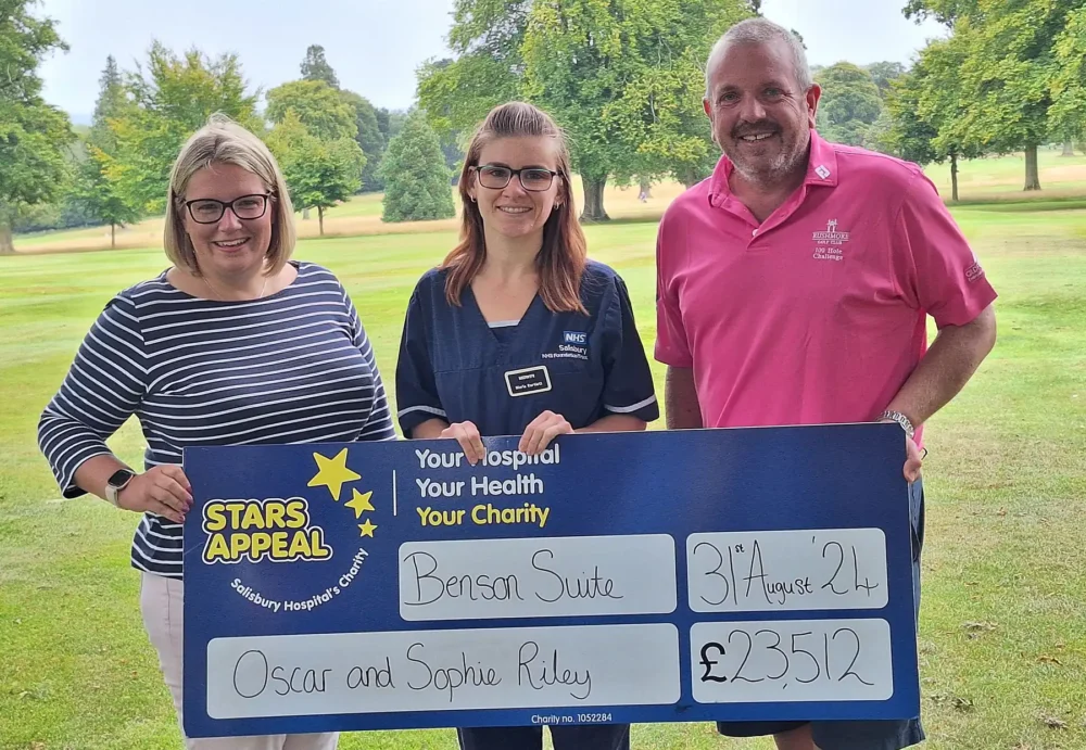 Neal and Els Riley with Maria Bartlett from the Benson Suite team