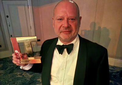 Paul Byrne, Perfect Pet insurance CEO with the award Picture: Tedaisy Insurance Group