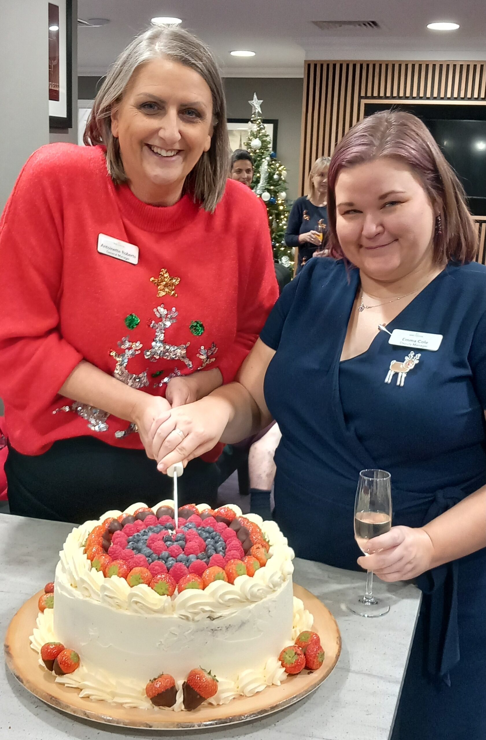 Antoinette Roberts, general manager and Emma Cole, deputy manager cutting the cake Picture: Wilton Place Care Home