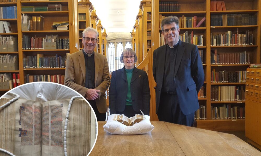 Canon treasurer Ed Probert, librarian Dr Anne Dutton and The Revd Nicholas Papadopulos, Dean of Salisbury with the Sarum Master Bible Picture: Salisbury Cathedral