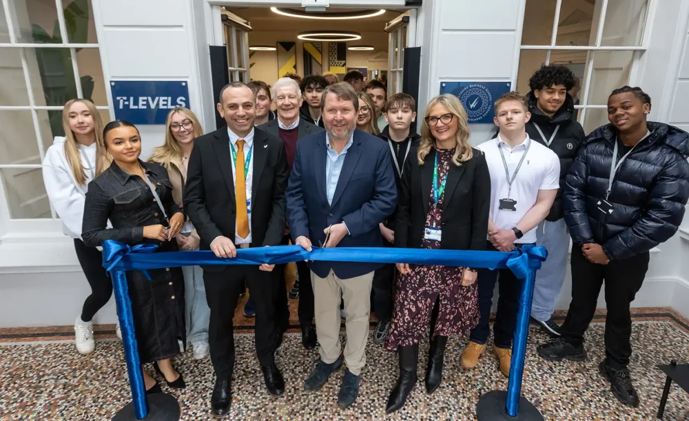 Nick Jenkins cuts the ribbon at the new Wiltshire Business School