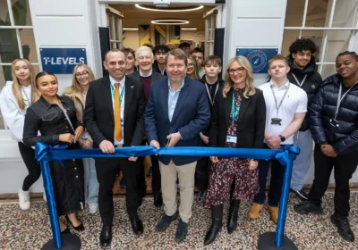 Nick Jenkins cuts the ribbon at the new Wiltshire Business School