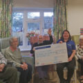 Residents Douglas Parish, Diana Wilson, John Parfitt and Joan Hills presenting the cheque to Salisbury Foodbank Manager Maria Stevenson Picture: Colten Care