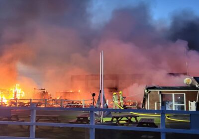 The fire service said Hangar 3 partially collapsed, with the nearby restaurant and cafe affected by the blaze Picture: Dorset & Wiltshire Fire and Rescue