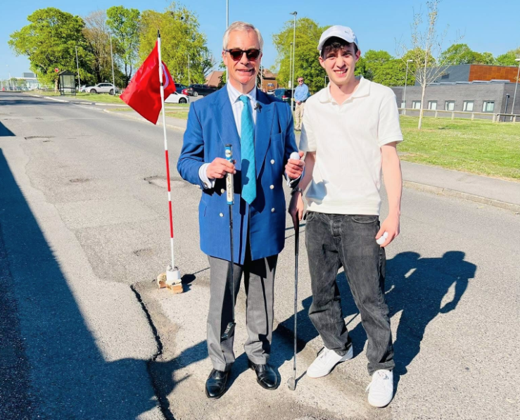 Nigel Farage posing for a photo with Ben Thornbury who invited him down to Larkhill to play pothole golf Picture: Ben Thornbury