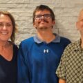 Read Easy coordinator Clare Potter, Mark and coach Paul Picture: Read Easy