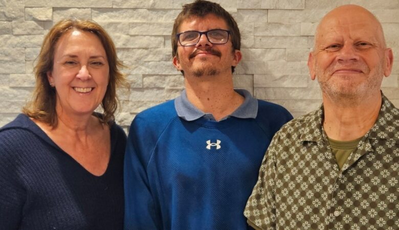 Read Easy coordinator Clare Potter, Mark and coach Paul Picture: Read Easy