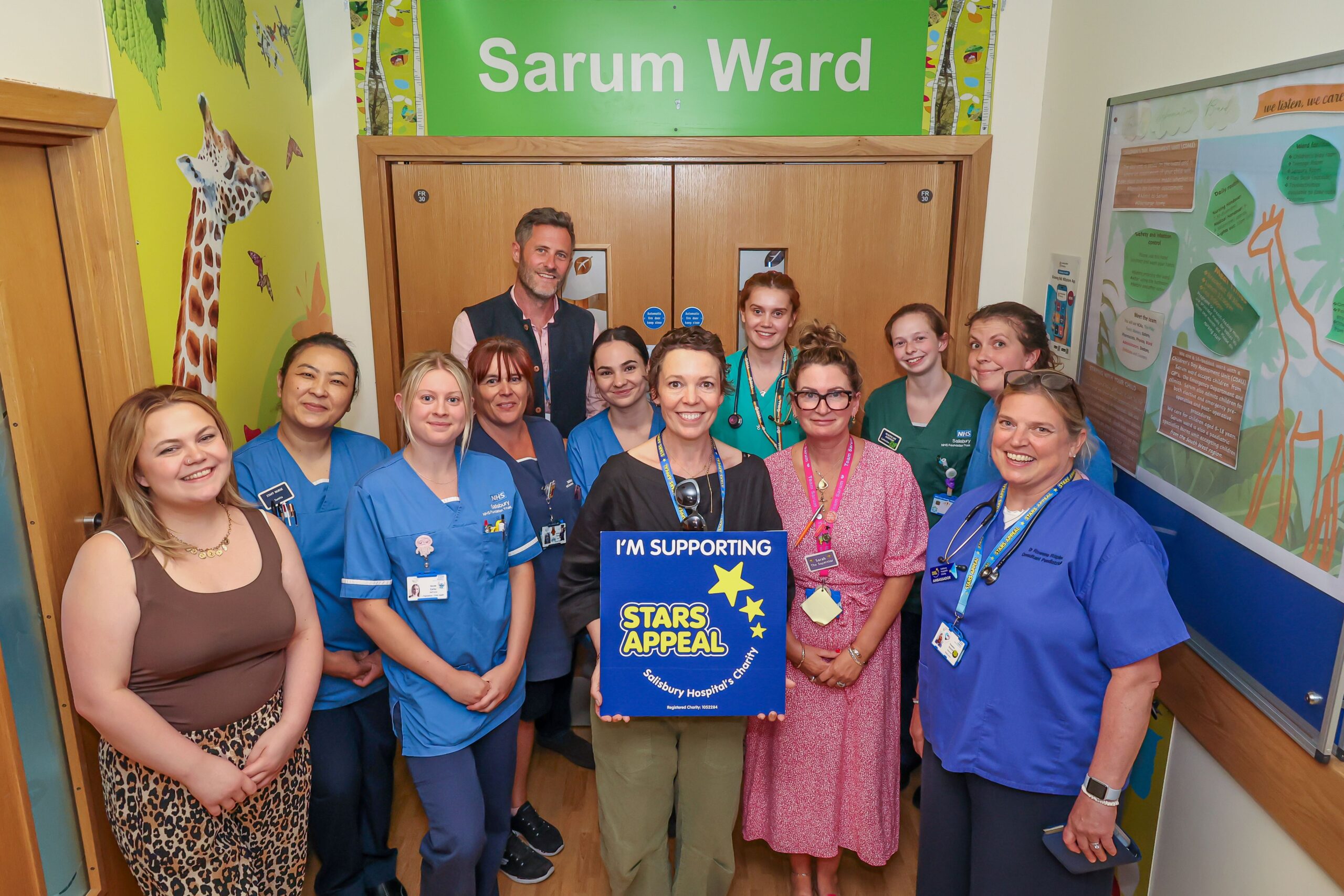Olivia with Sarum Ward staff and Lord Pembroke Picture: Spencer Mulholland 