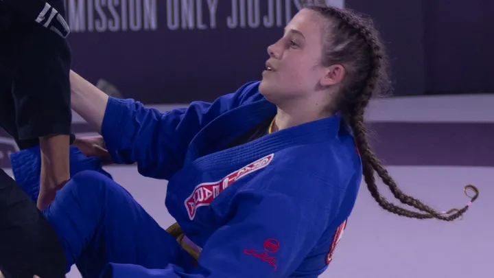 Taya's success was acknowledged by actor and BJJ competitor Tom Hardy who signed her gold medal Picture: GoFundMe/Taya Jones