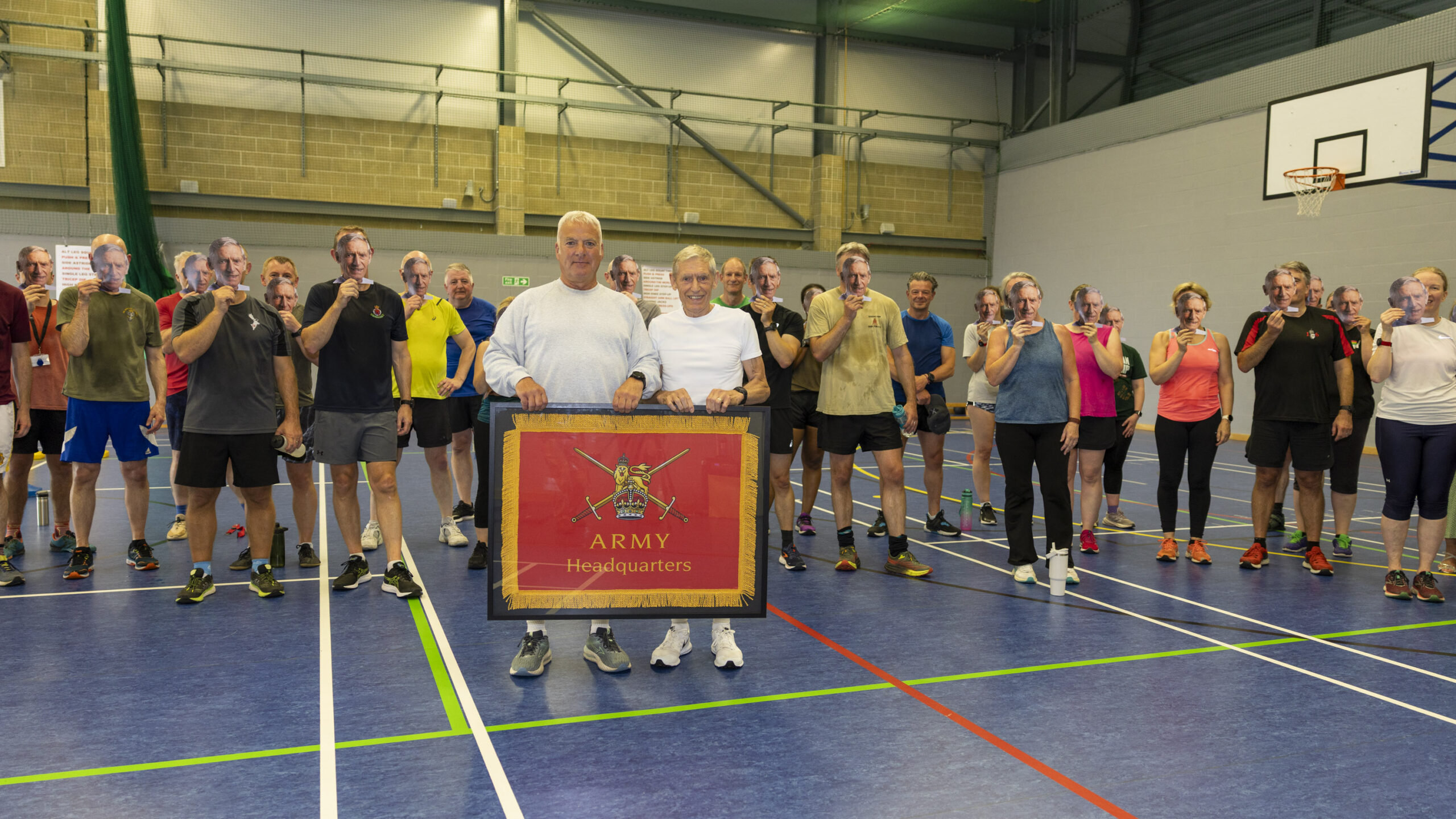 At the end of the training session Barry’s wife was presented with a bouquet of flowers and Colonel John Dagless, Army HQ Picture: Crown Copyright 2025