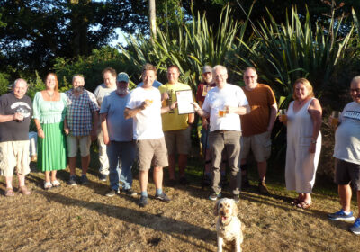 Brewer Paul Bartlett (left) receives his Beer of the Festival award certificate from Andrew Hesketh of Salisbury CAMRA At the front is Sunny, the dog who was the partial inspiration for the beer’s name. Picture :Salisbury CAMRA