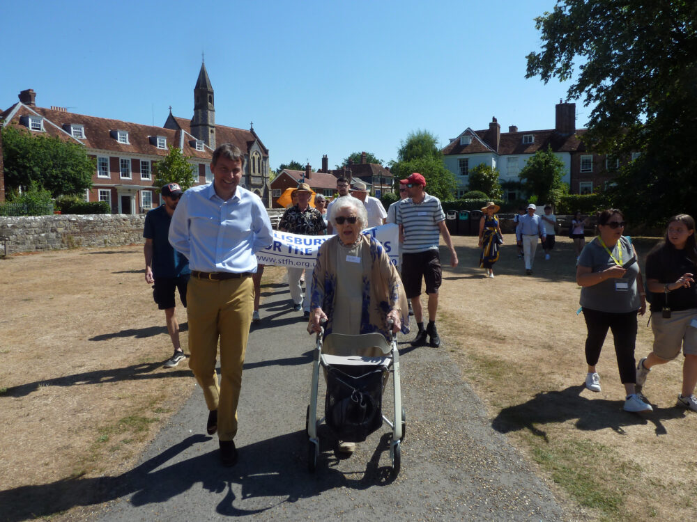 Phyll leading the way with with Salisbury MP John Glen as temperatures hit the high 20s Picture: STFH