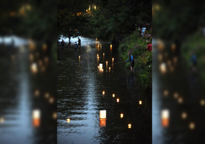 Candles mix with lanterns from Hiroshima as they float down the River Avon Picture: Salisbury CND