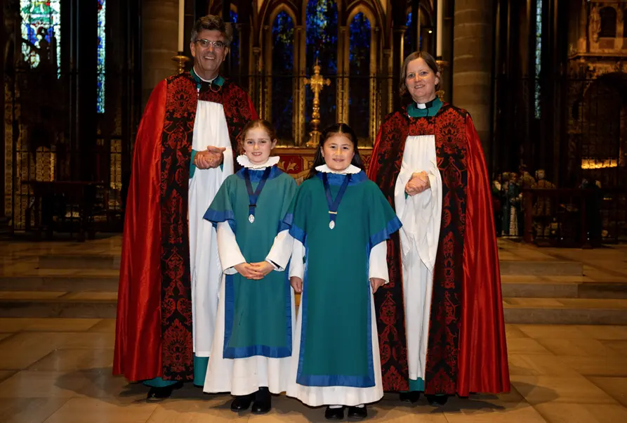 The Very Revd Nicholas Papadopulos and the Revd Anna Macham with Arabella Luck and Phoebe Yuan-Richards Picture: Finnbarr Webster