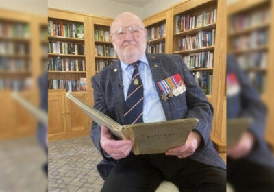 Douglas Parish looking over diary extracts from 1944 Picture: RNA