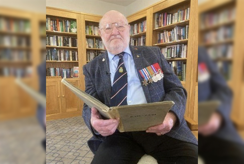 Douglas Parish looking over diary extracts from 1944 Picture: RNA