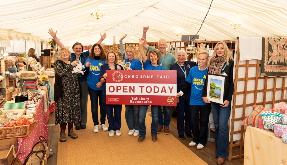 Members of the Rockbourne Fair team with Stars Appeal Ambassadors and stallholders at the opening of this year’s event Picture: Mark Bastick