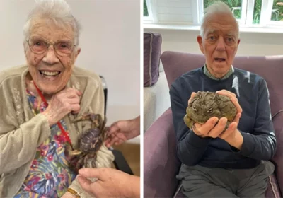 Residents holding a purple crab and a bullfrog Picture: The Cedars