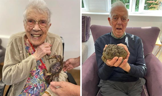 Residents holding a purple crab and a bullfrog Picture: The Cedars
