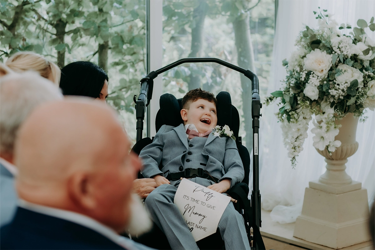 Alfie got the giggles during the wedding ceremony Picture: Peter Welland Photography