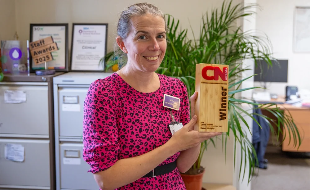 Becca Murphy posing with her trophy Picture: Salisbury NHS Foundation Trust